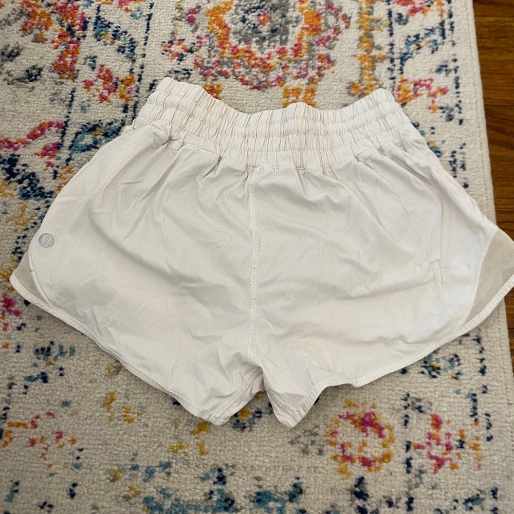 White hotty hot lululemon shorts. High wasted size 0.